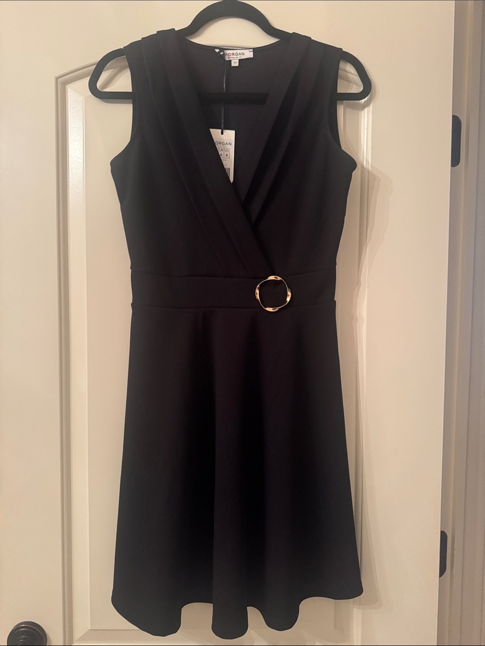 Morgan de Toi Black Sleeveless Wrap Midi Dress with Gold Buckle Accent